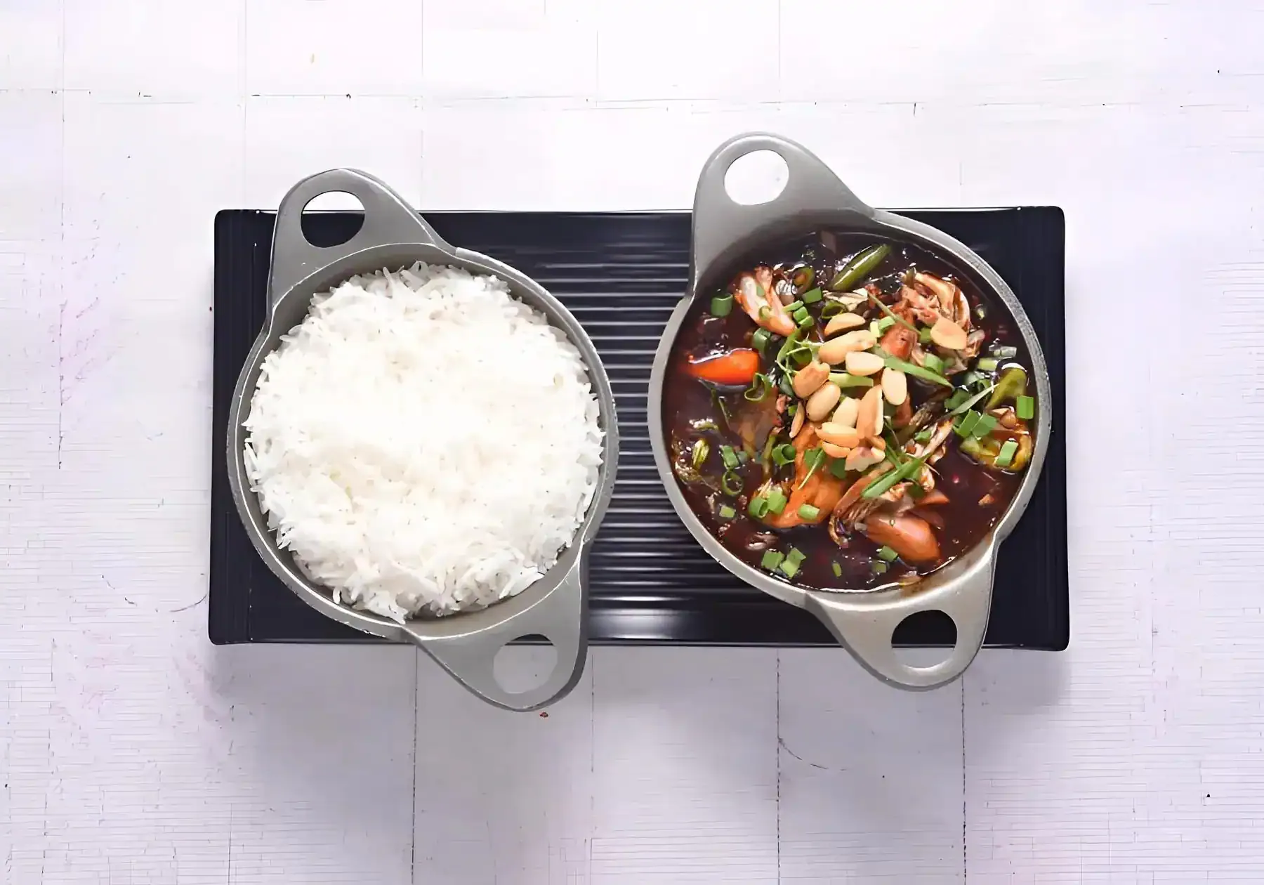 An Asian curry with steamed rice