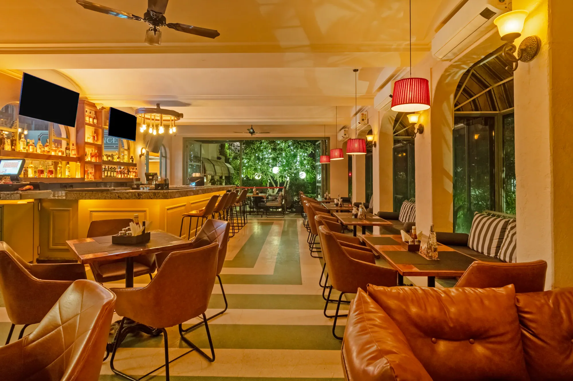Tan leather and arched windows in the lounge